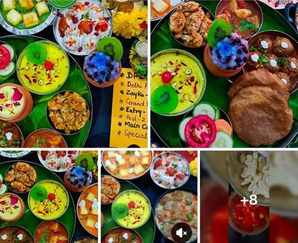 A large Navratri spread of more than a dozen bowls including kadhi, puris, raita and desserts arranged on a banana leaf